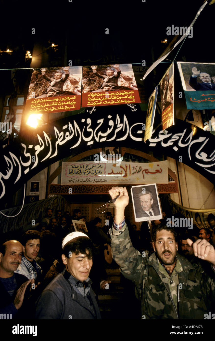 Crowds demonstrate in support of President Assad during the 1991  referendum campaign. The personality cult of Assad. Stock Photo