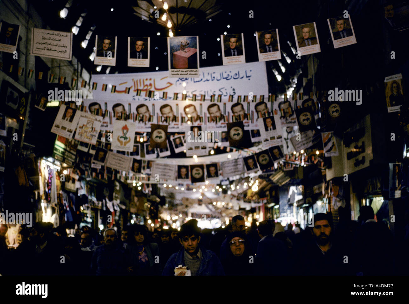 Posters of President Assad adorn the central market of Damascus, Syria. Personality cult of President Assad Stock Photo