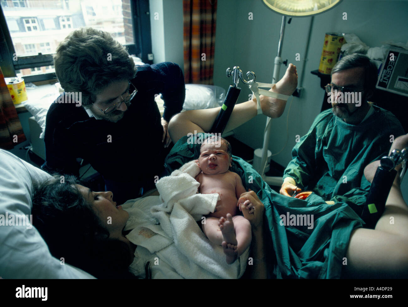 Woman hospital gown birth hi-res stock photography and images - Alamy