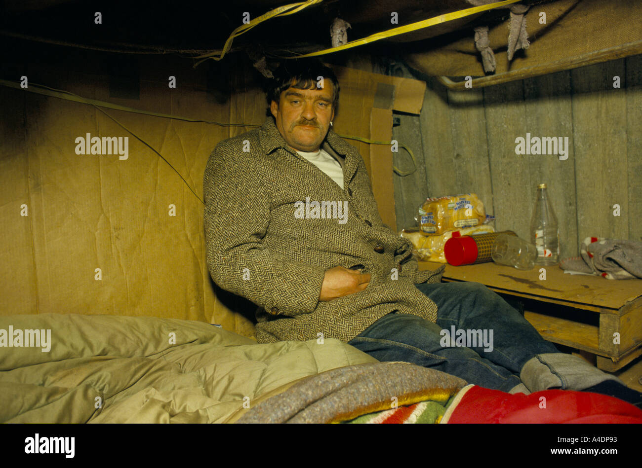 A Homeless Man In His Shelter Under The Royal Festival Hall Stock Photo