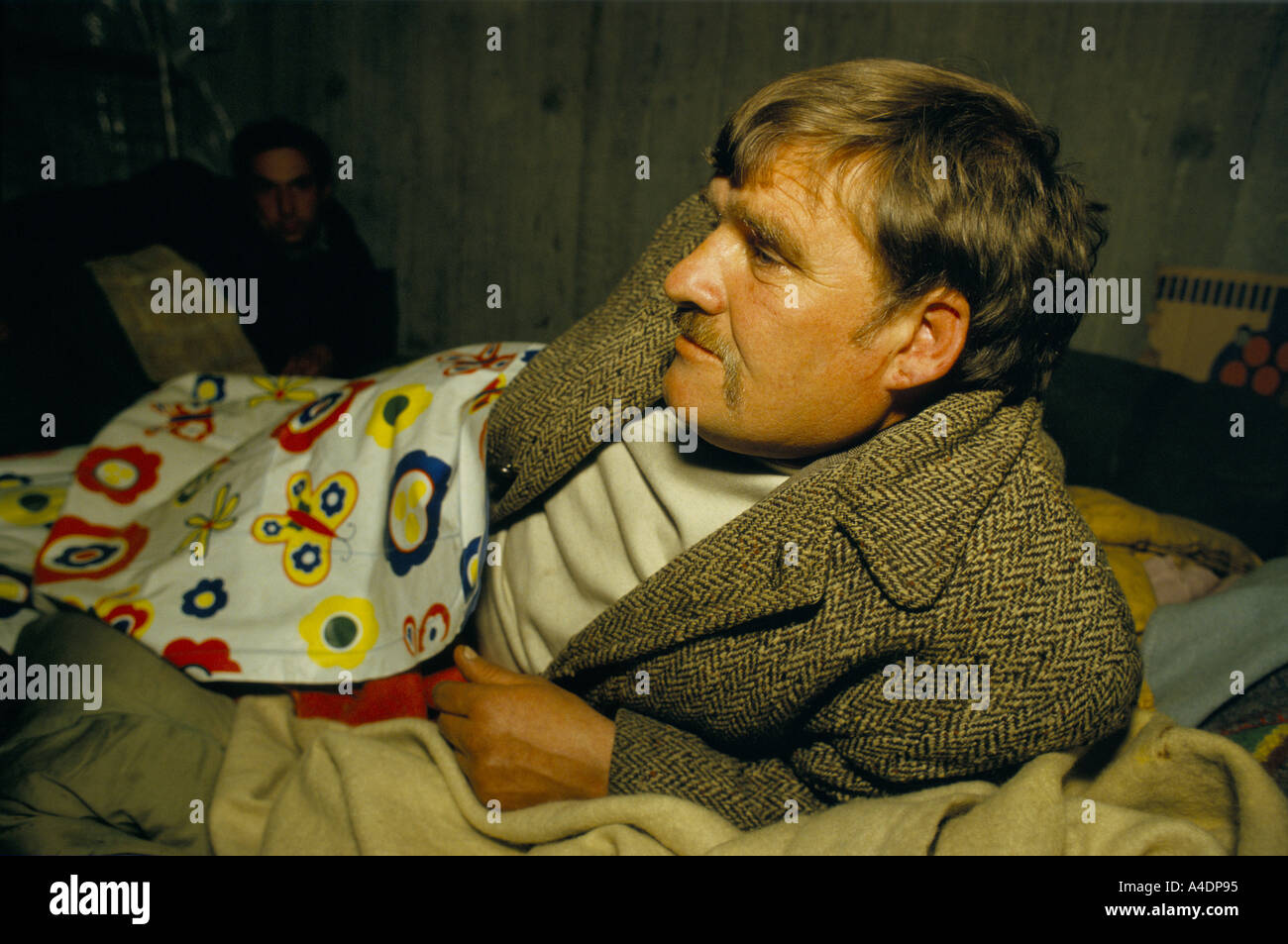 A Homeless Man In His Shelter Under The Royal Festival Hall Stock Photo