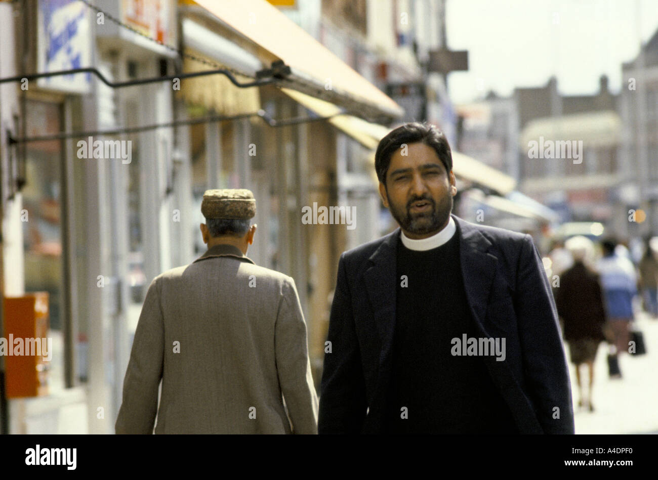 An Asian priest in Southall, London Stock Photo