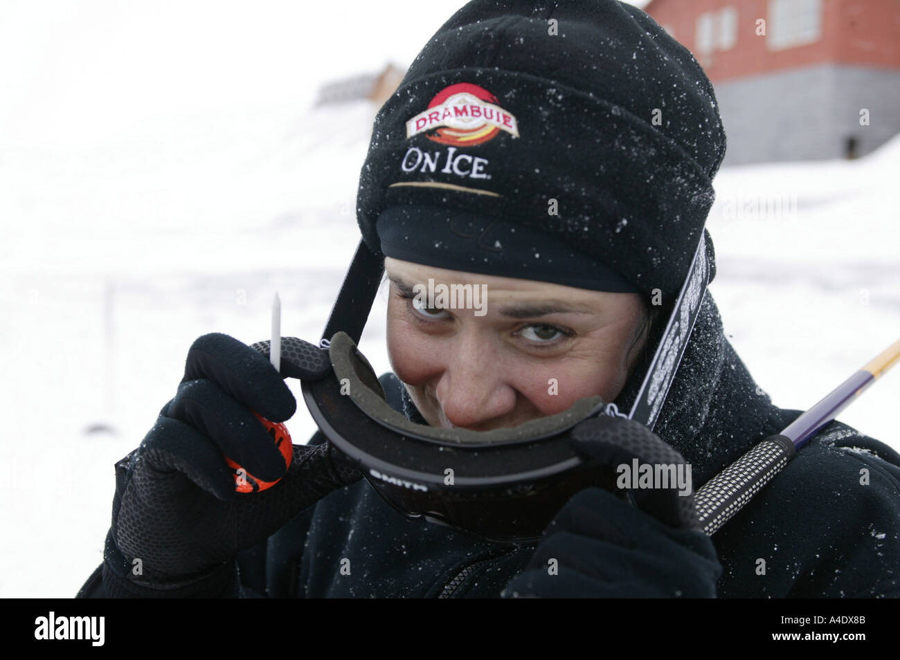 Nicole Materne, female competitor at the 2004 Drambuie ice golf championship in Svalbard, Norway. Stock Photo