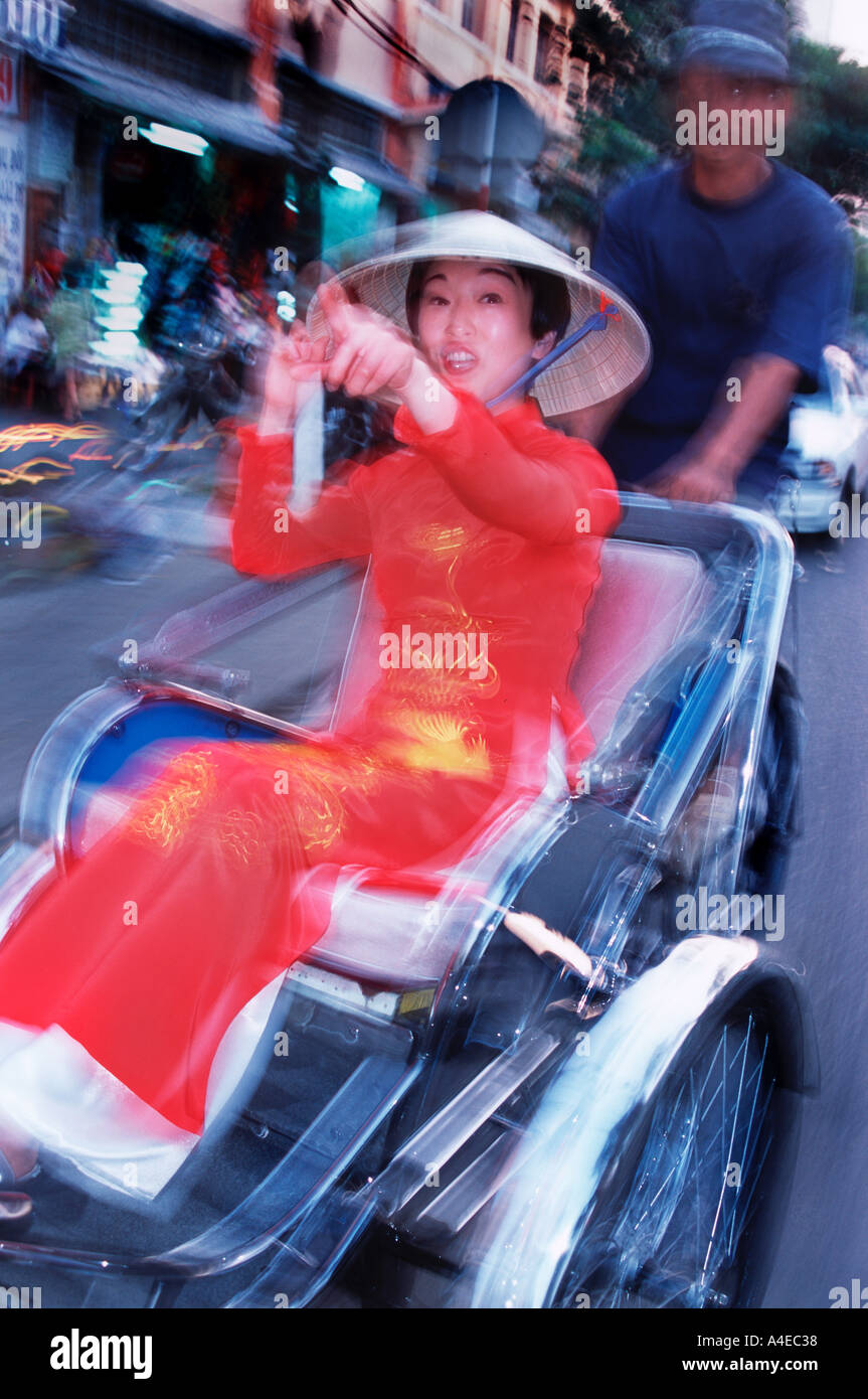 Vietnamese Woman on Rickshaw Stock Photo - Alamy