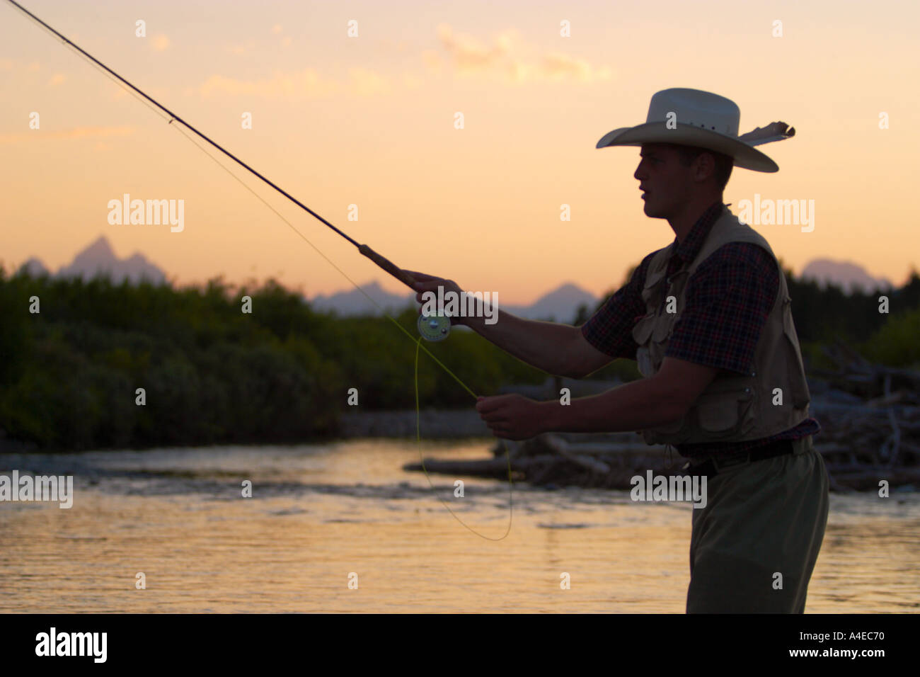 cowboy hat at sunset Stock Photo 
