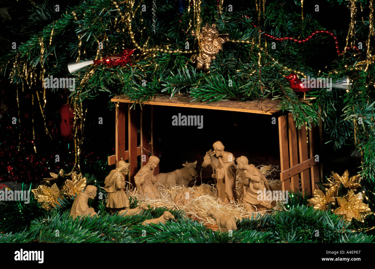 A model nativity scene with christmas tree Stock Photo