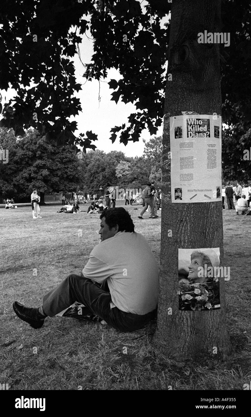 WHO KILLED DIANA poster in Kensington Palace Gardens London on the anniversary of her death Stock Photo