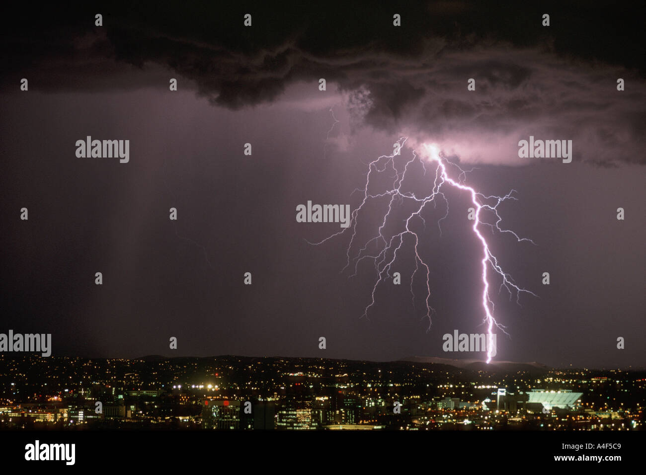 Lightning strikes over city night hi-res stock photography and images ...