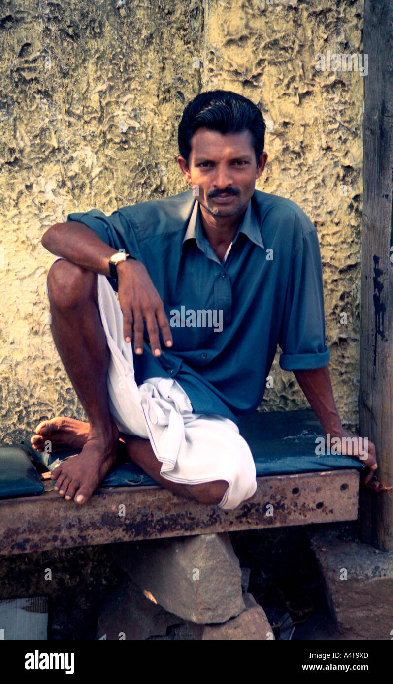 Portrait of a seated man in Kerala, India Stock Photo