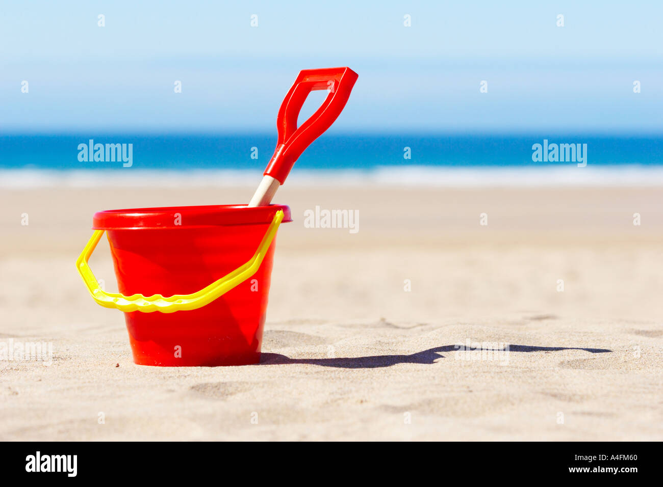Red Bucket and Spade on Beach Holiday Vacation Concept Stock Photo Alamy