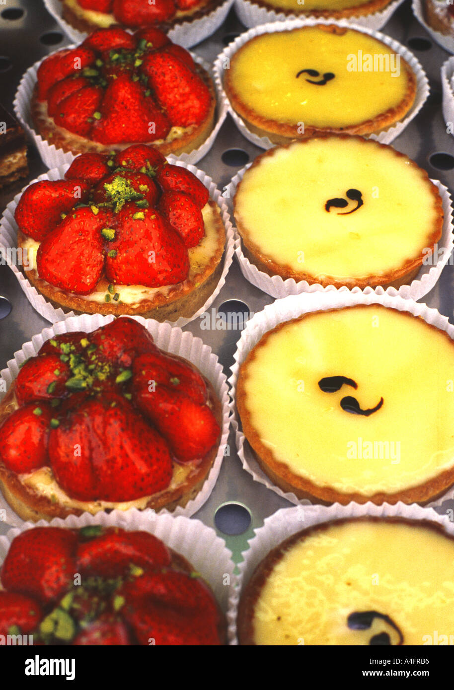 France Paris pastry shop window with strawberry and lemon pastries Stock Photo