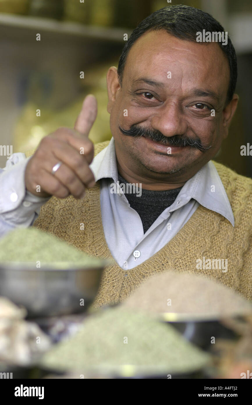 Spice shop owner New Delhi India Stock Photo Alamy
