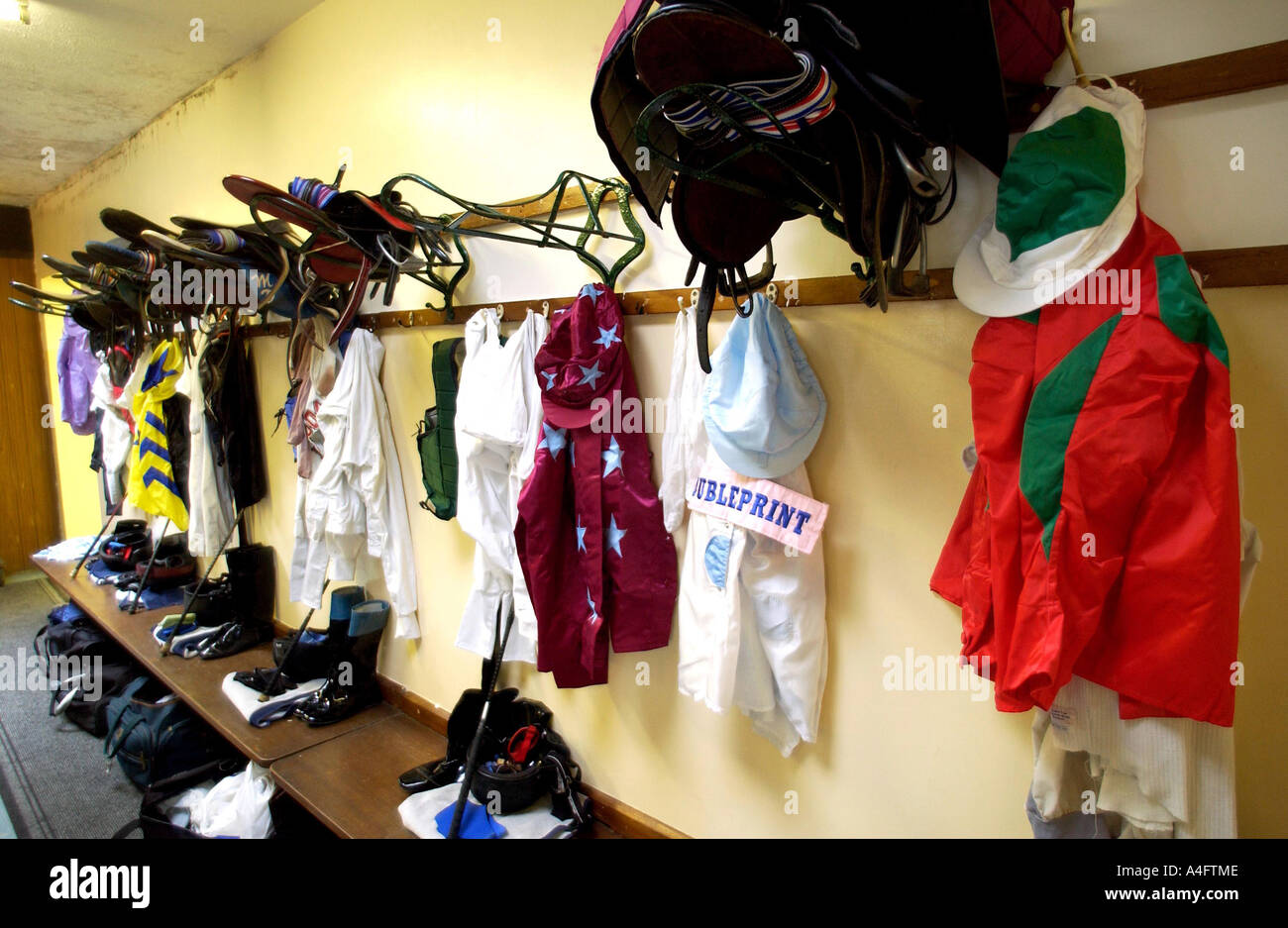 The jockeys' changing room at Lingfield Park racecourse with their gear ready for action Stock Photo