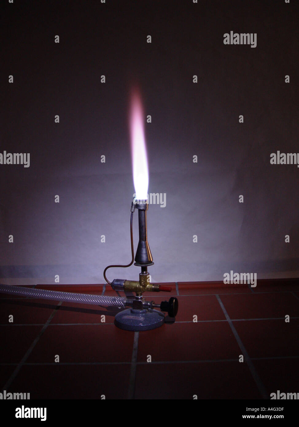 Bunsen burner as symbol for chemistry and or chemical experiments Stock