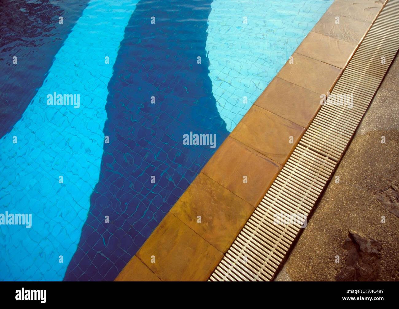 The edge of swimming pool Stock Photo