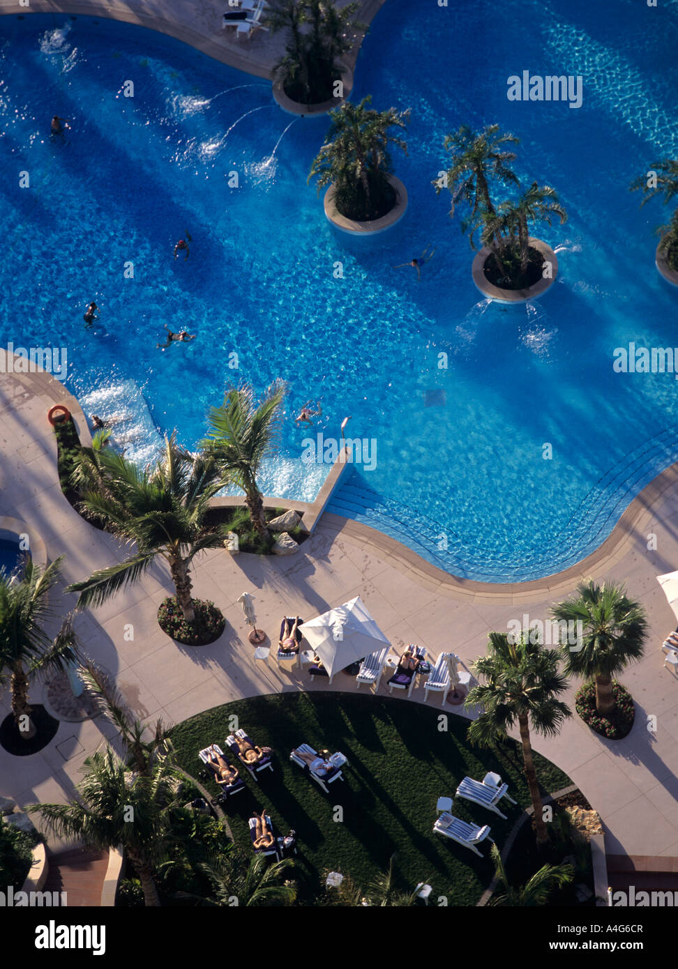 Aerial view of holiday makers by the pool Stock Photo