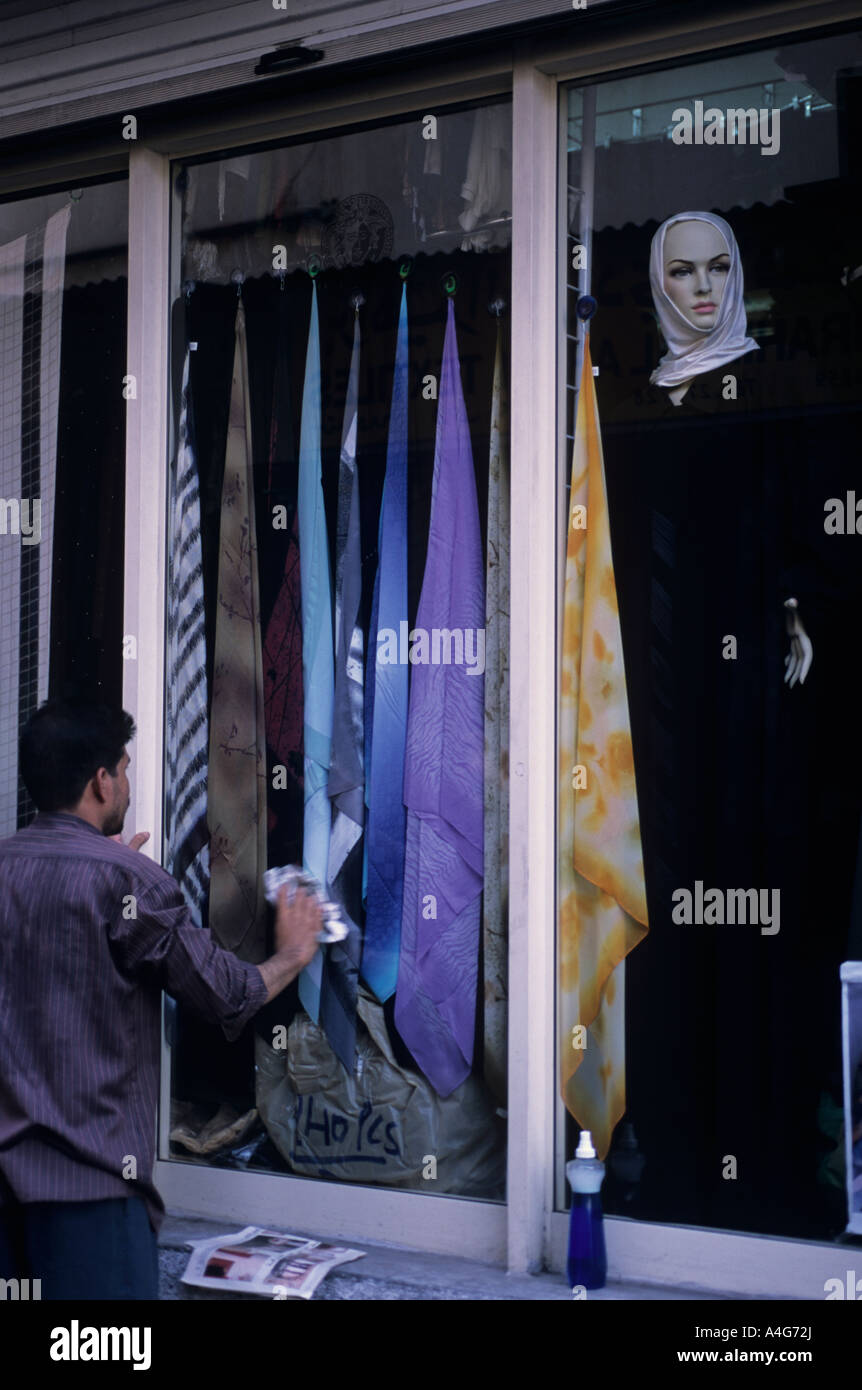 Retail window display of colorful fabrics in a textile shop Stock Photo ...