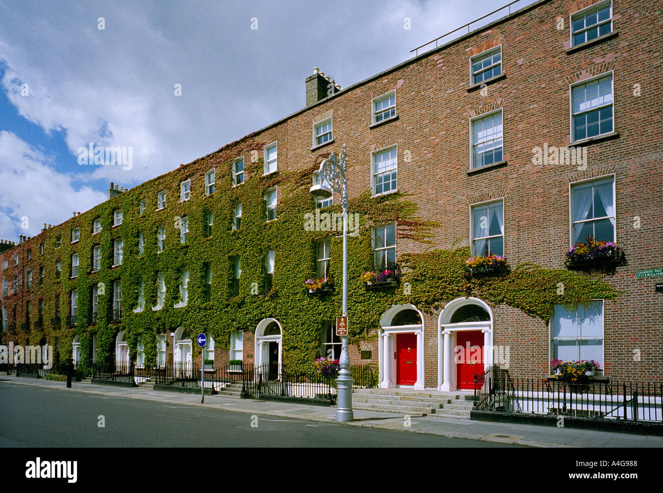 One side of the Georgian Fitzwilliam Square in Dublin Ireland a thriving commercial area and firmly on the tourist trail Stock Photo