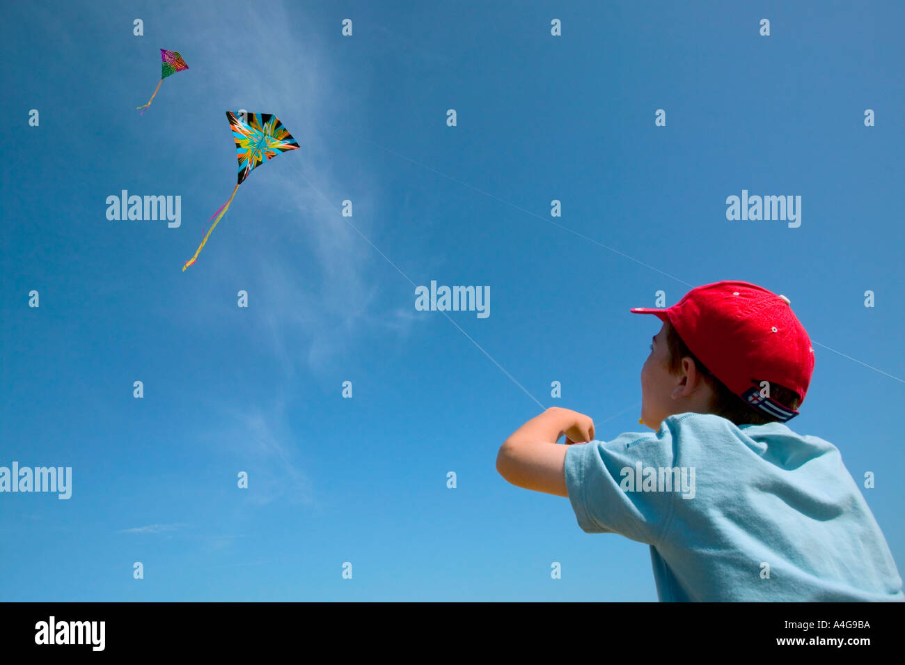 Boy Flying Kite Stock Photo