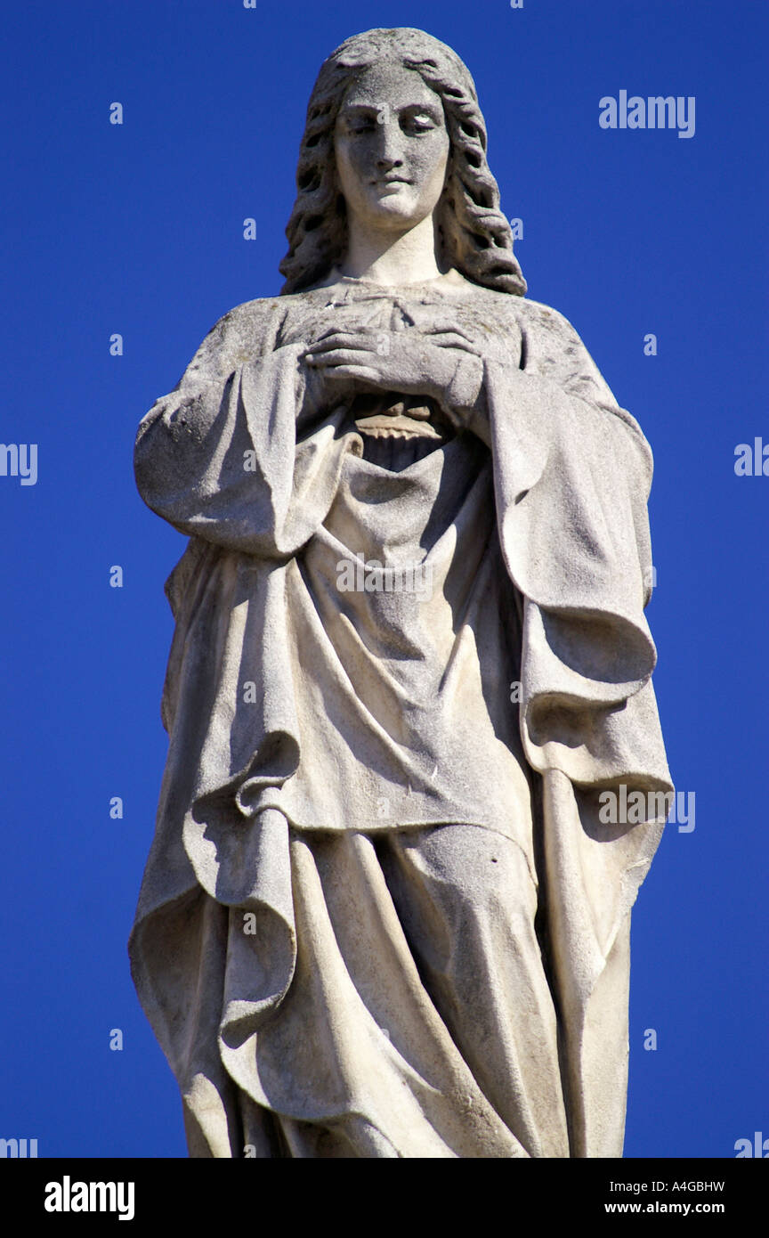 St. Mary white statue over blue sky in Banska Bystrica, Slovakia Stock Photo