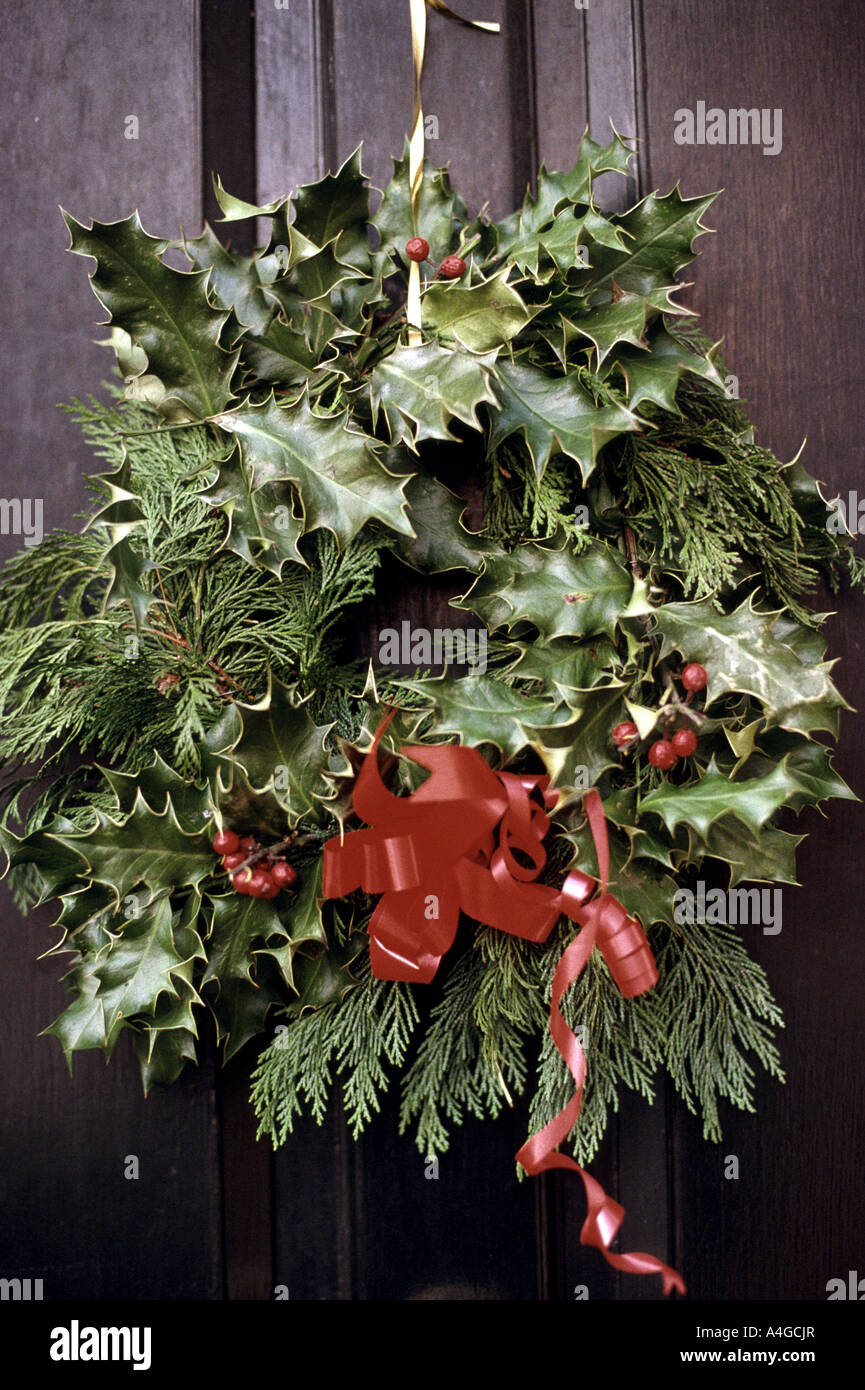 Christmas wreath on a front door of a house Stock Photo