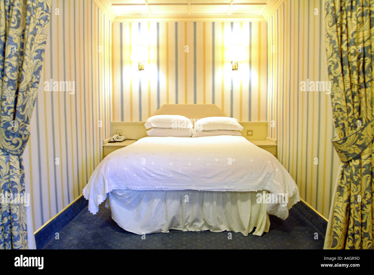 A double bed in the Bredbury Hotel near Manchester in England. Stock Photo
