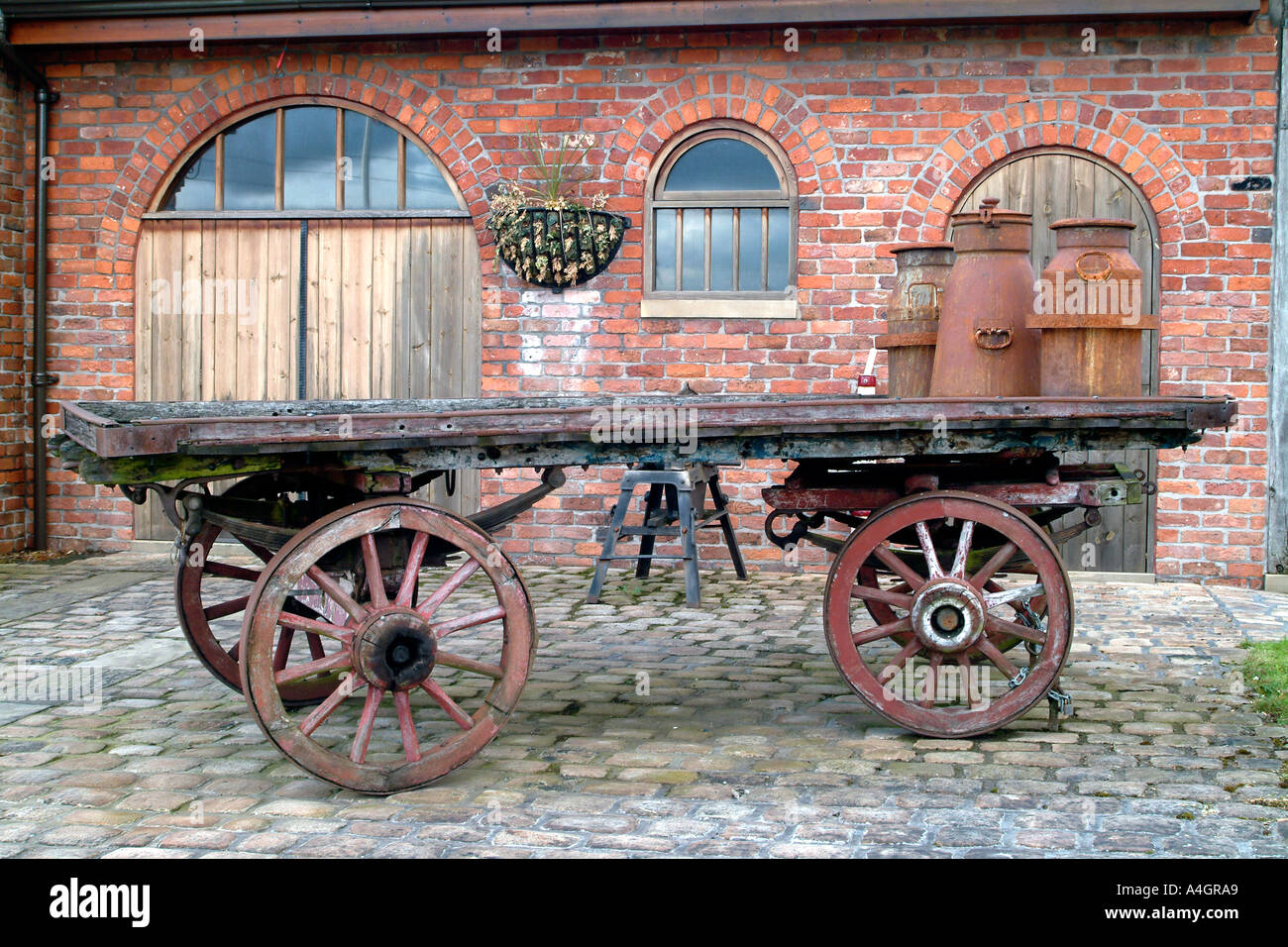 An old wagon outside the Bredbury Hotel (formerly the Bradburie Hall) near Manchester in England. Stock Photo