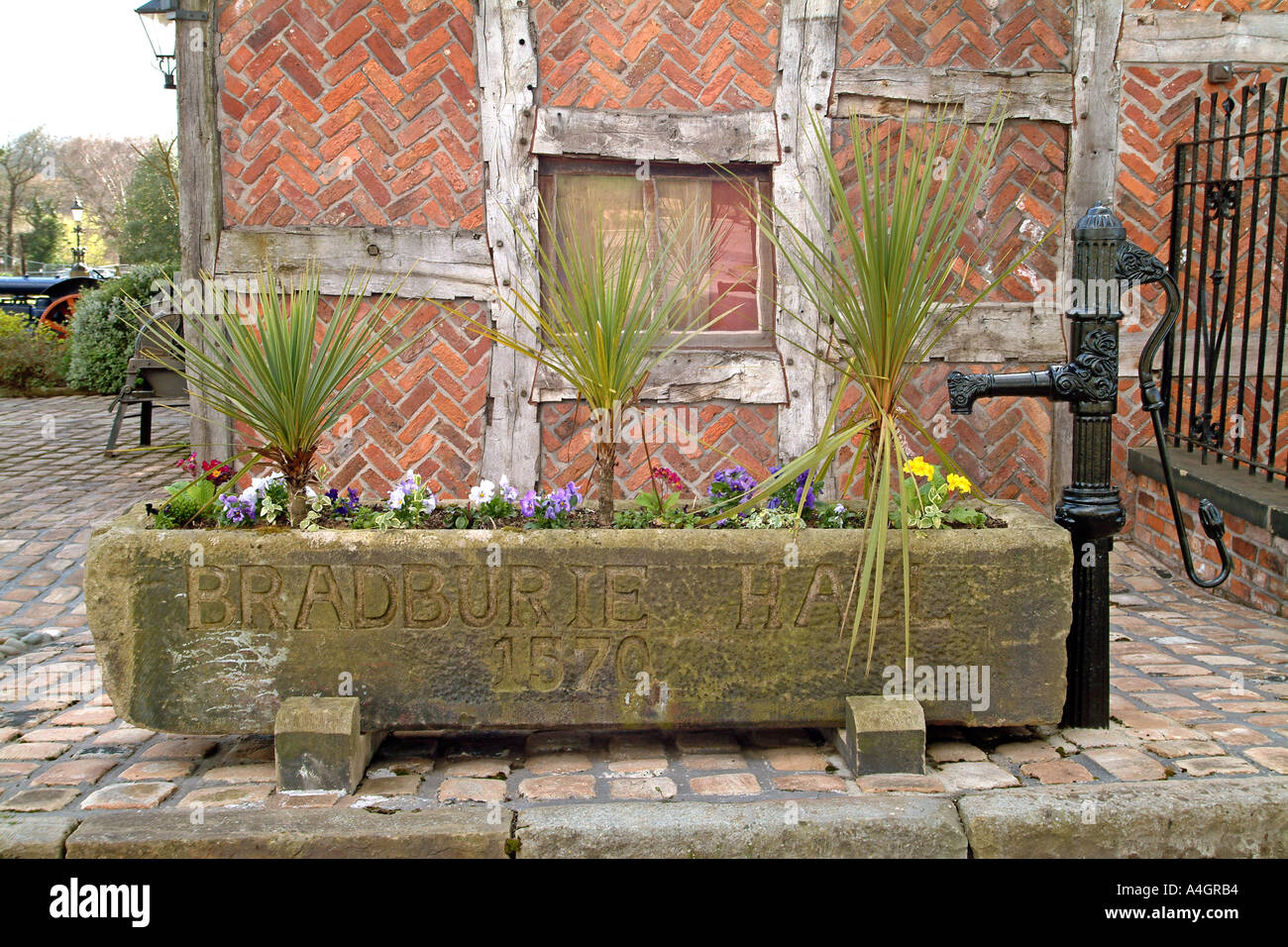 An old water pump outside the Bredbury Hotel (formerly the Bradburie Hall) near Manchester in England. Stock Photo
