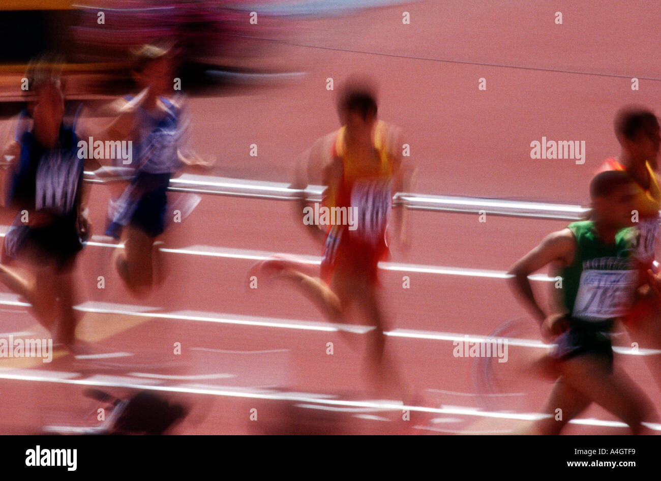 Blurred Motion of Sprinters in Race Stock Photo - Alamy