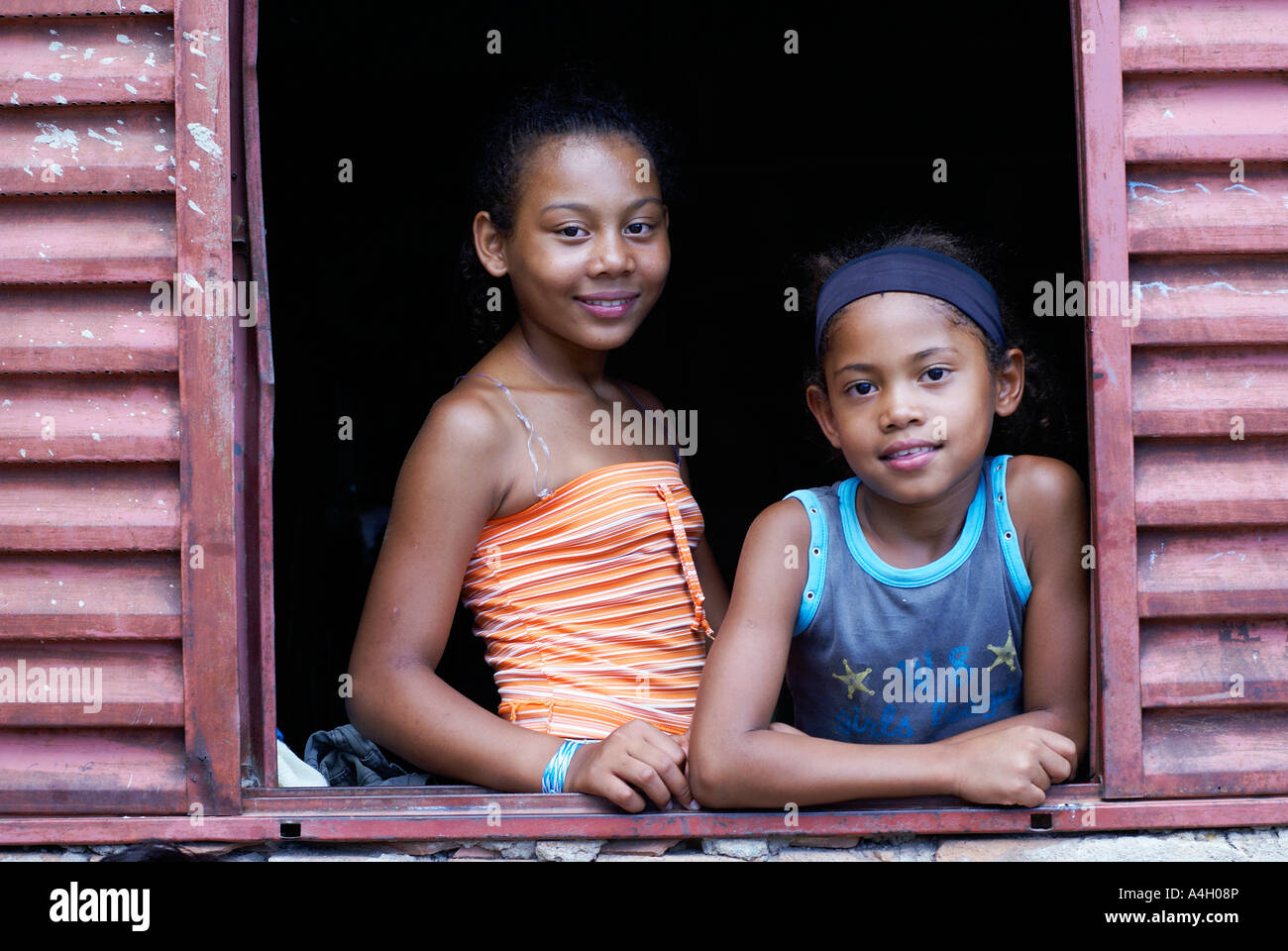 Brazilian girls in a window frame, Taubate, Sao Paulo, Brazil Stock Photo