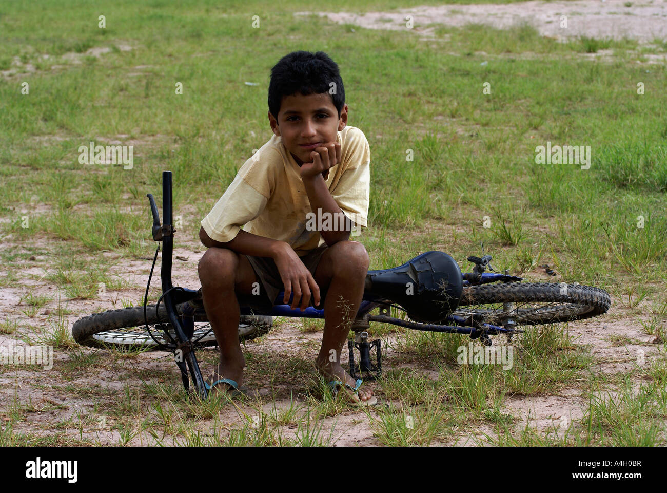 Poor boy bicycle portrait hi-res stock photography and images - Alamy