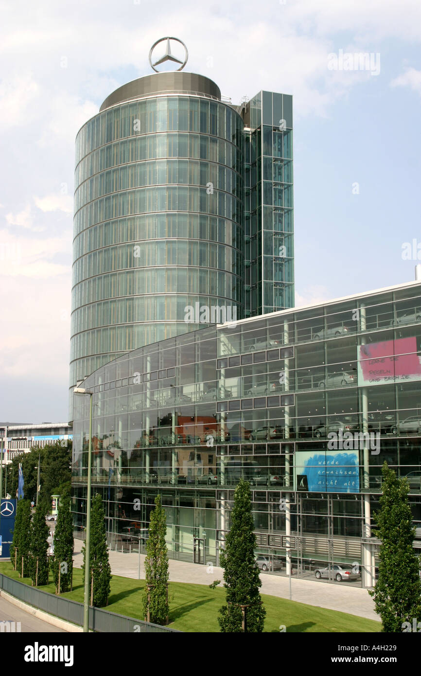 Daimler Chrysler House Showroom with Philosophical signs and tower Munich Bavaria Germany Stock Photo