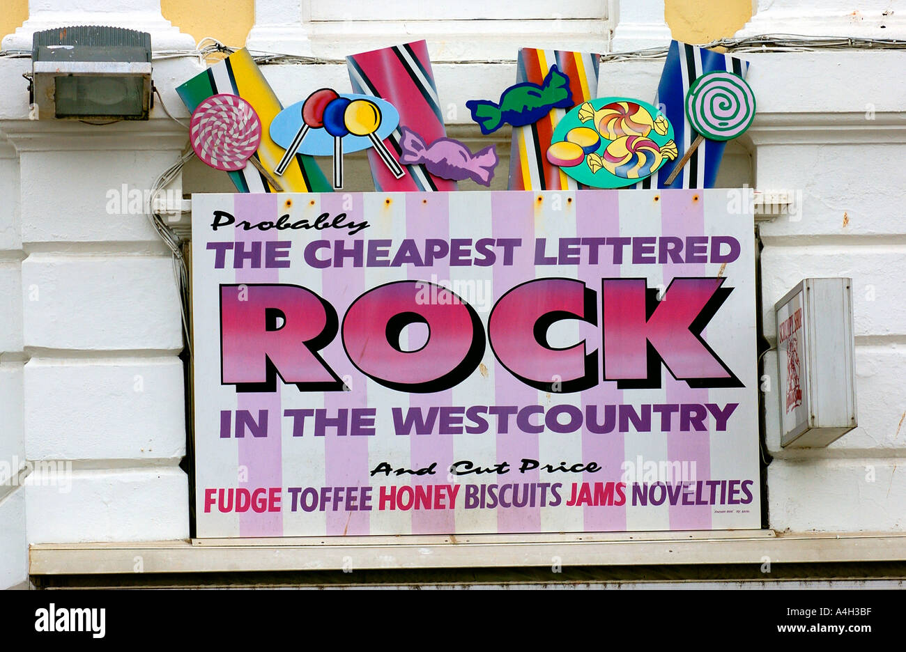 A shop hoarding advertising confectionary at Victoria Parade Torquay Devon England UK Stock Photo