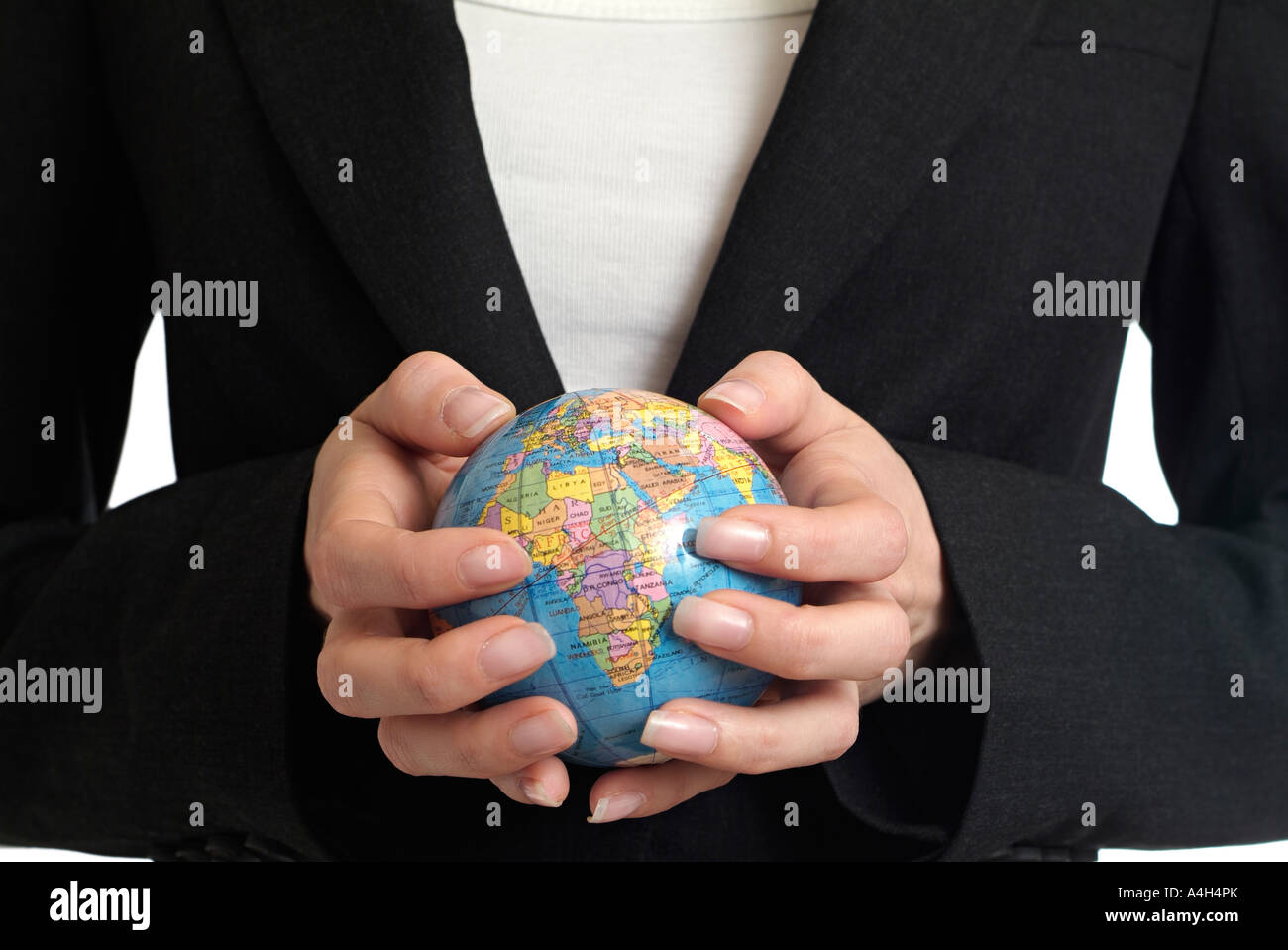 Globe in the Hands of a Business Woman Stock Photo