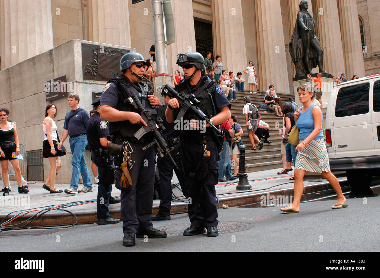 Heavily armed NYPD officers stand guard at the New York Stock Exchange