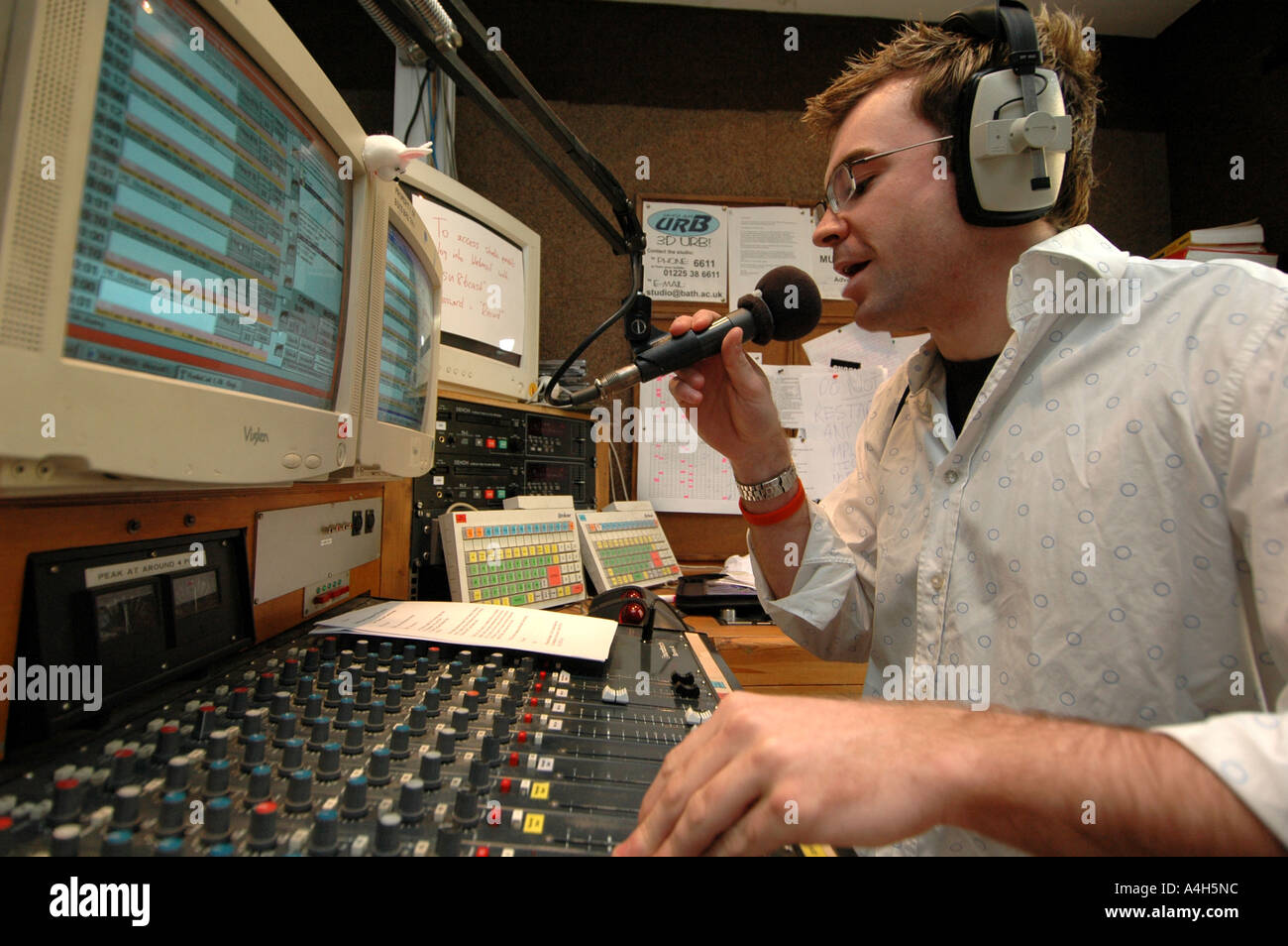 Student radio DJ on-air broadcasting from the studios of the University of  Bath in England Stock Photo - Alamy