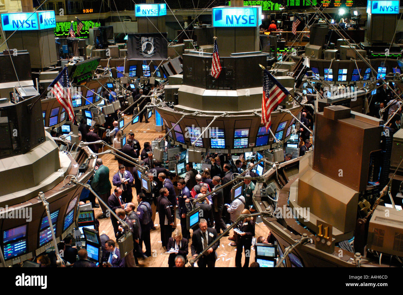 Stockbrokers Busy On The Trading Floor Of The New York Stock