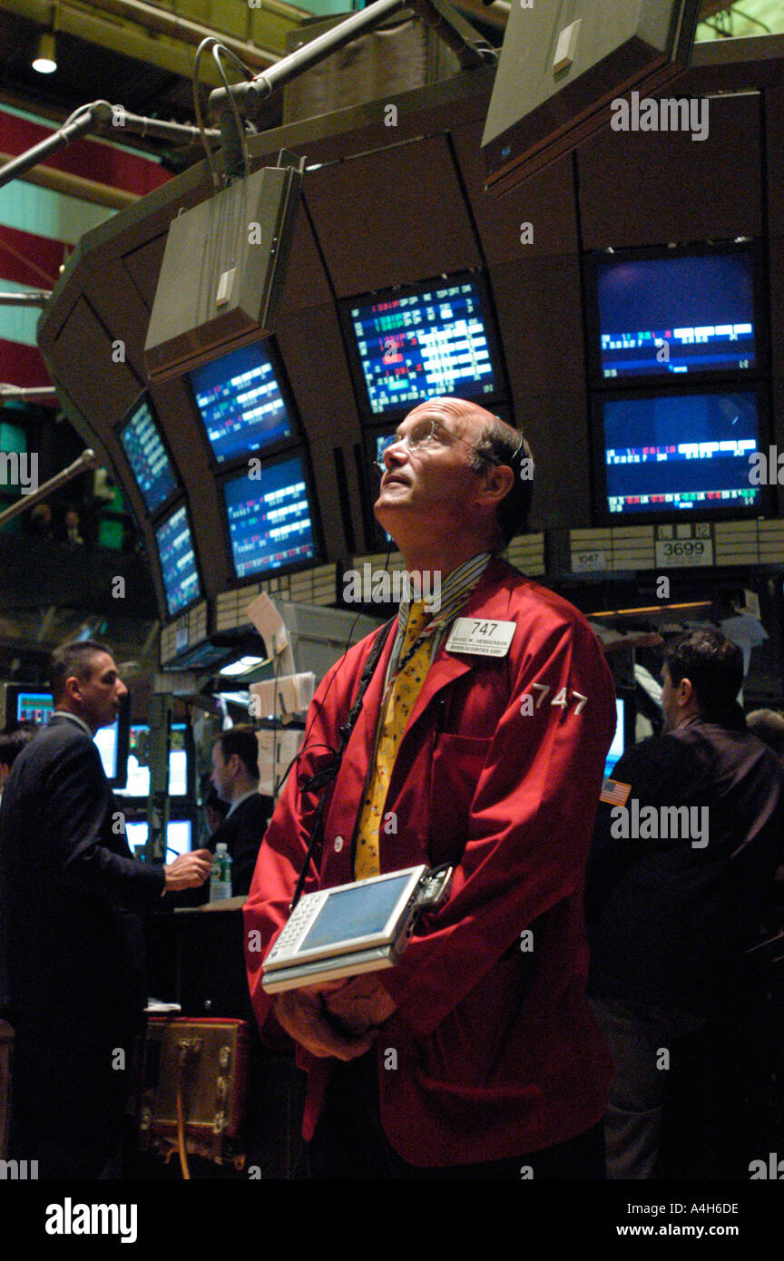 Stockbrokers busy on the trading floor of the New York Stock Exchange  Stock Photo