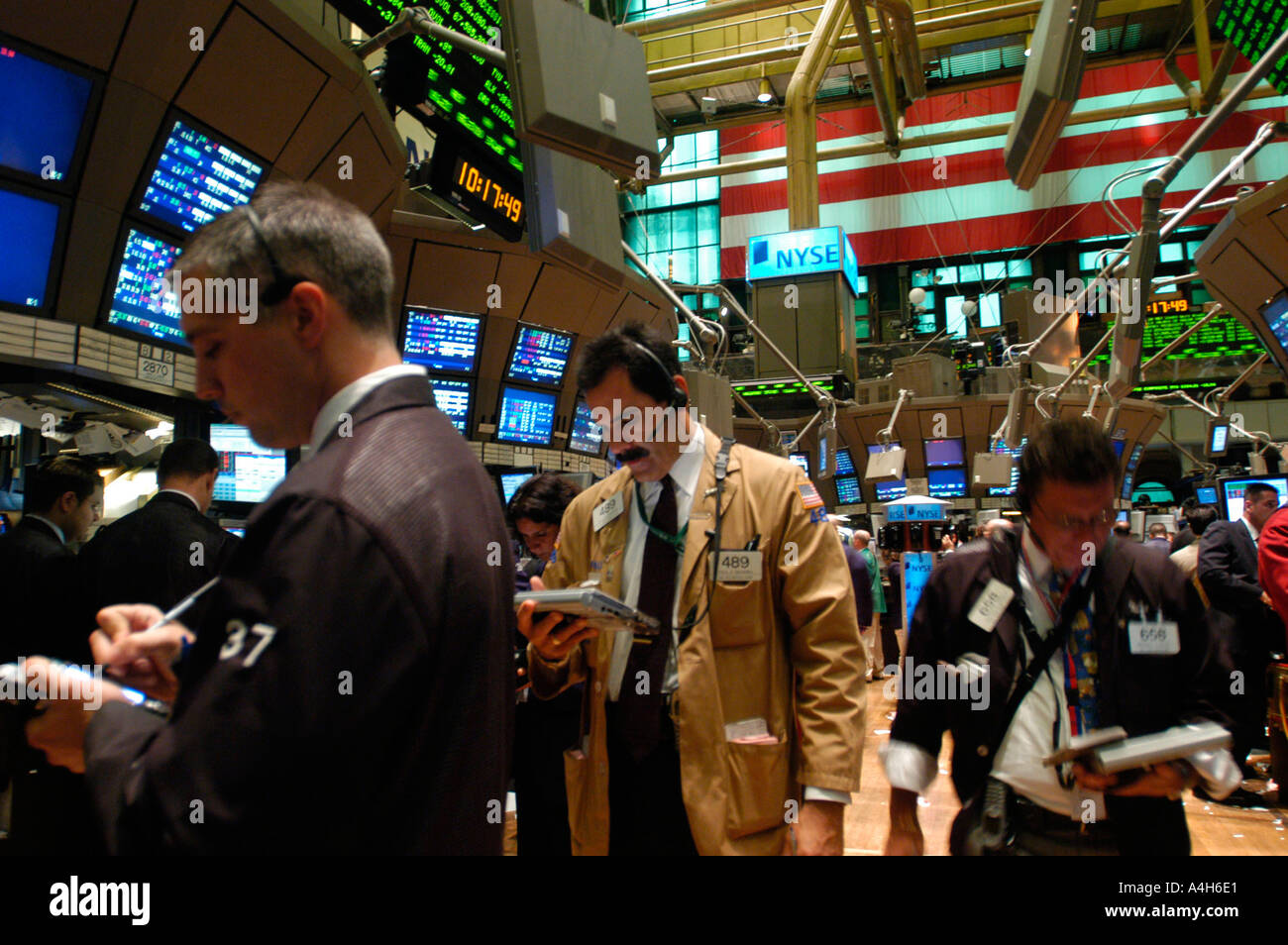 Stockbrokers busy on the trading floor of the New York Stock Exchange  Stock Photo