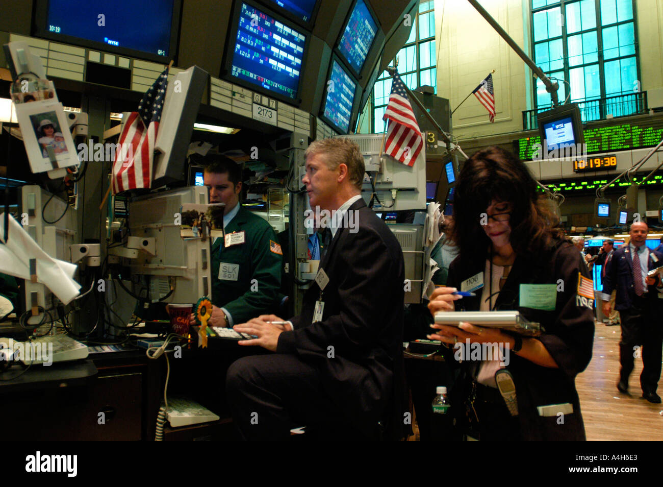 Stockbrokers busy on the trading floor of the New York Stock Exchange  Stock Photo