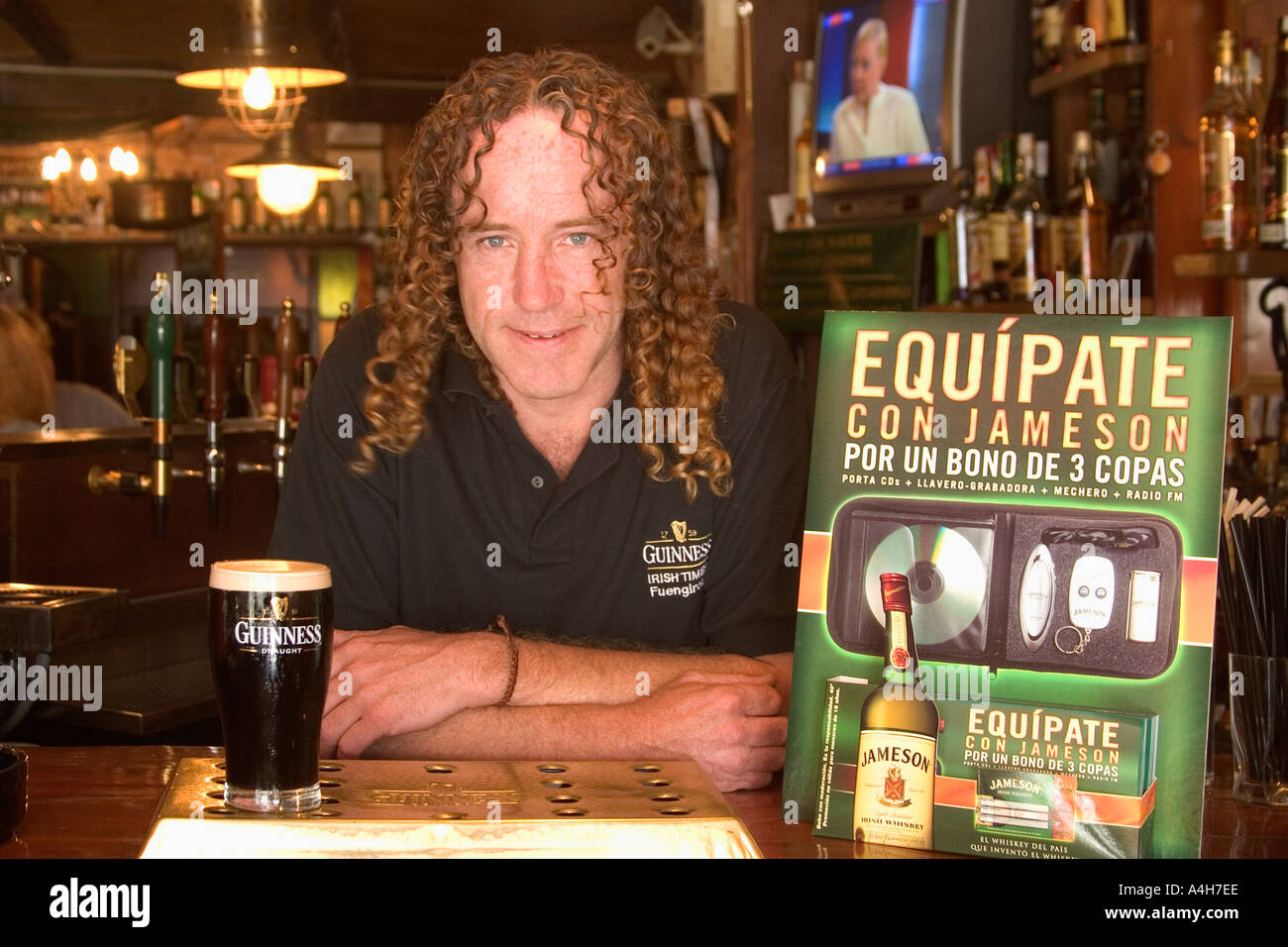 Fuengirola Costa del Sol Malaga Province Spain Barman Willie Walshe in The  Irish Times pub Stock Photo - Alamy