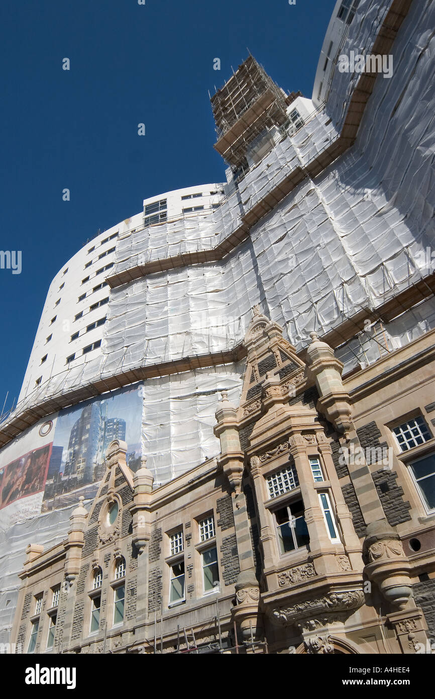 Altolusso apartments under construction with original old frontage from