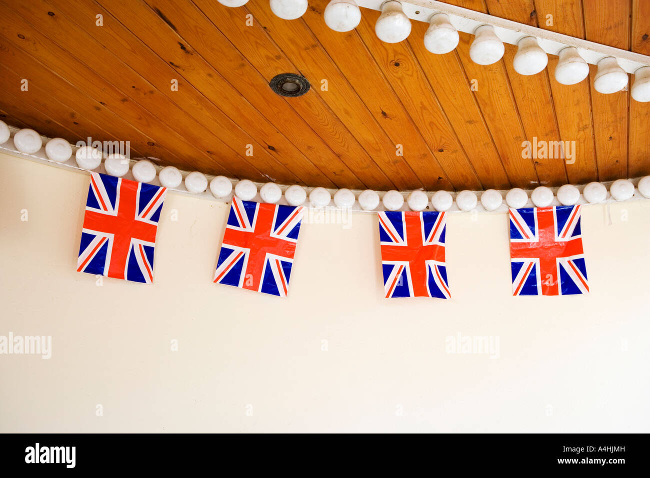 Union Jack flags hanging indoors Stock Photo Alamy