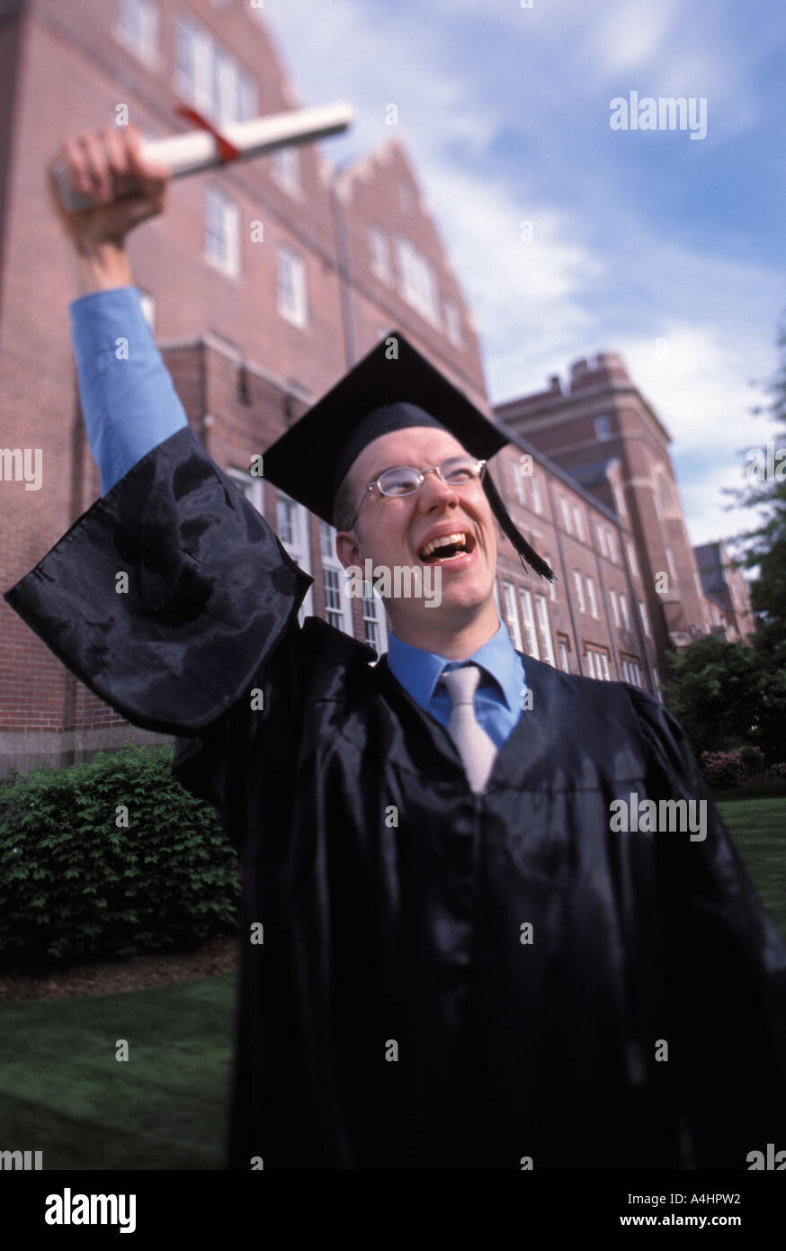 Celebrating Caucasian graduate Stock Photo