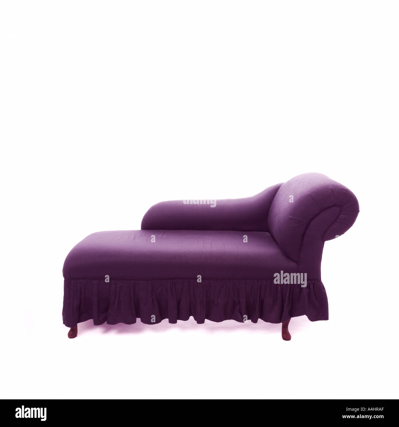Purple coloured chaise longue on white background Stock Photo Alamy