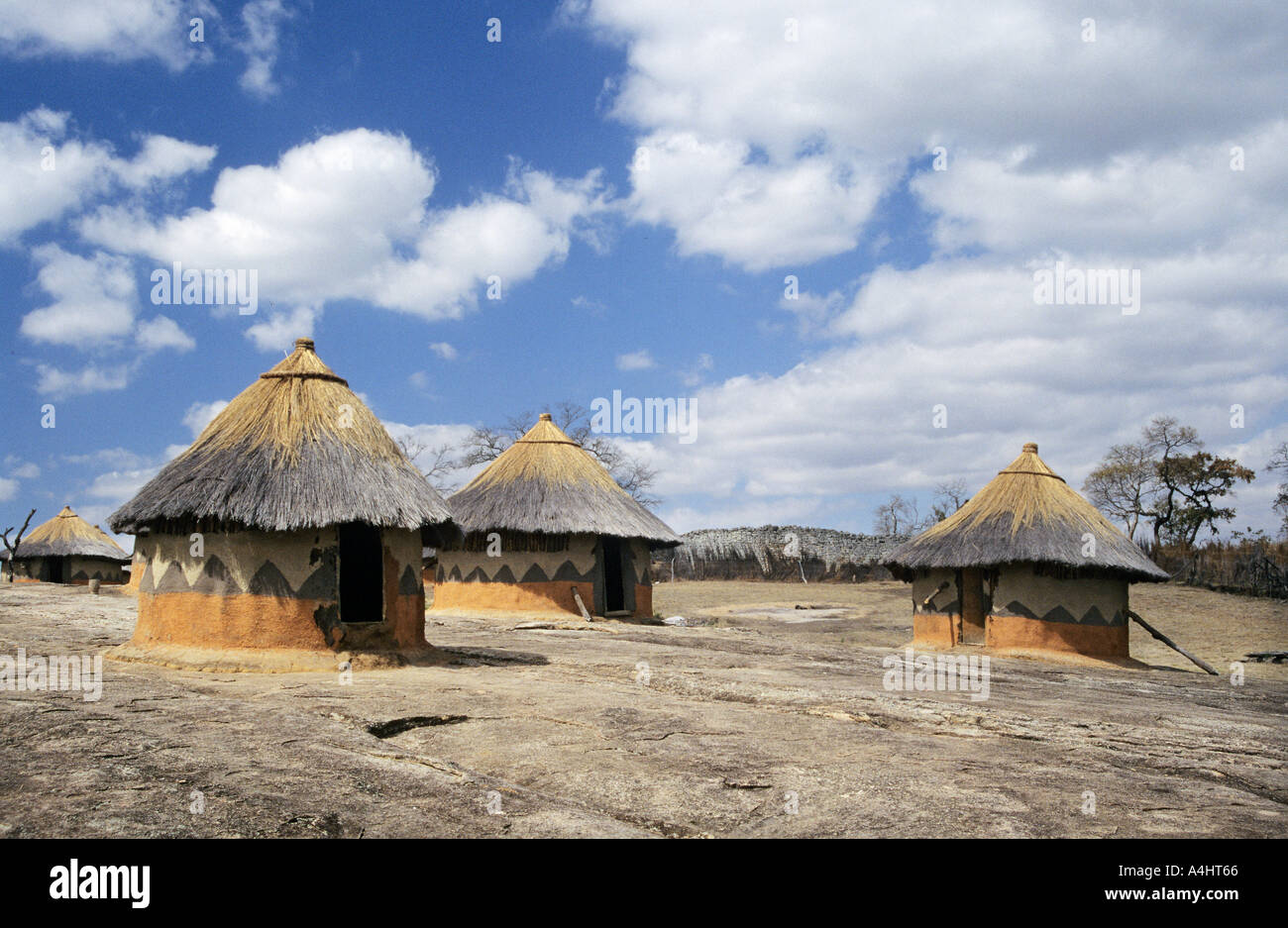 African mud huts thatched with straw Shona village recreation Stock