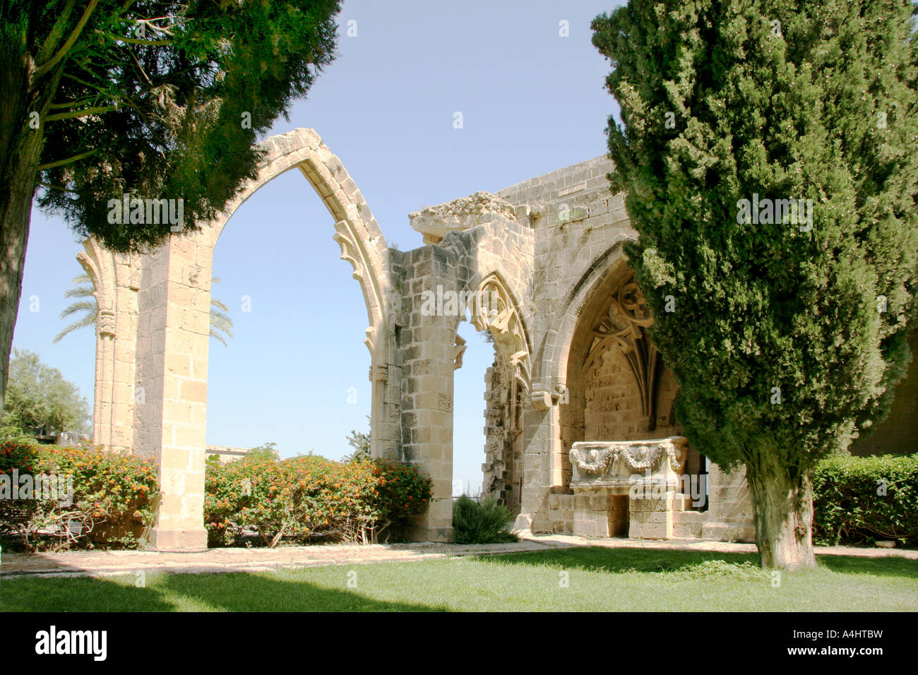 Gothic arches at Bella Pais Abbey 12th century with sarcophagus Keryneia, Girne, North Cyprus Stock Photo