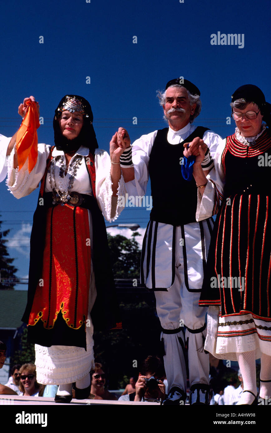 Greek Dancers in Ethnic Dress perform a Traditional Greek Dance in the City  of Vancouver British Columbia Canada Stock Photo - Alamy
