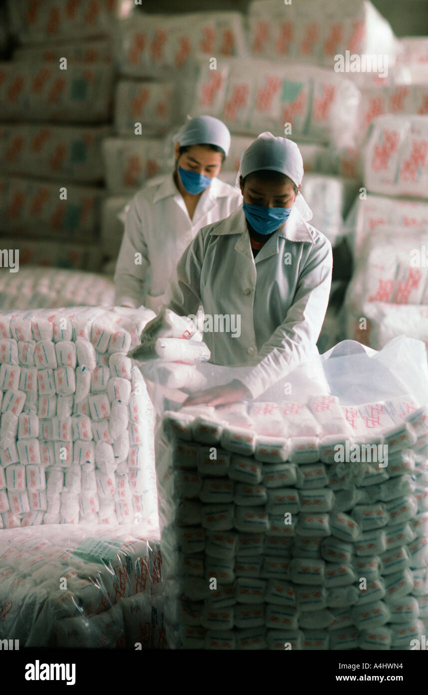 Mexican warehouse workers packaging sugar Stock Photo