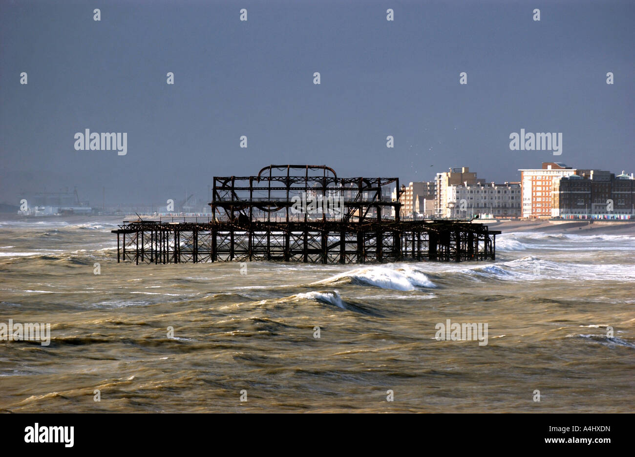 The derelict West Pier on Brighton seafront which has been destroyed by storms and fire in recent years - Stock Photo